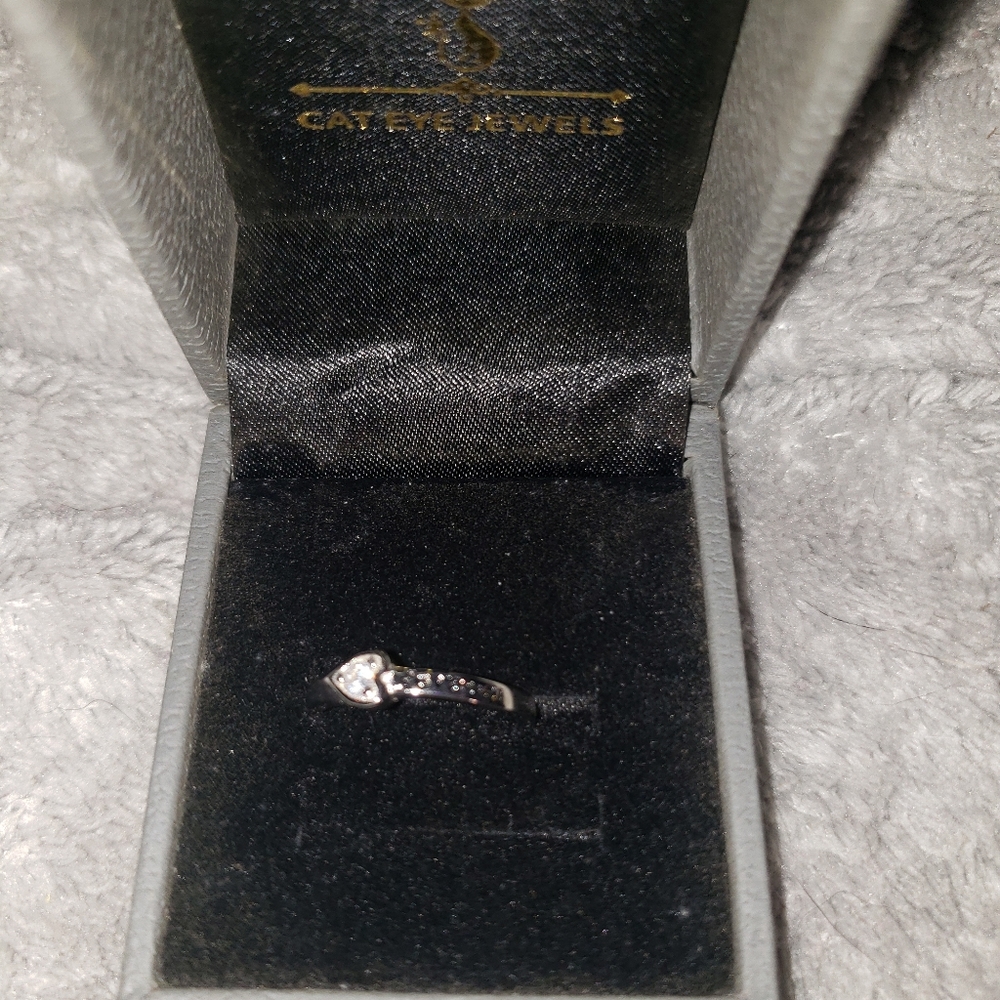 Silver 925 ring that says forever